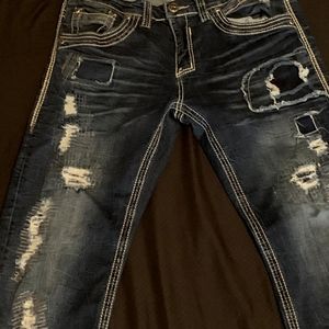 A pair of Affliction jeans
